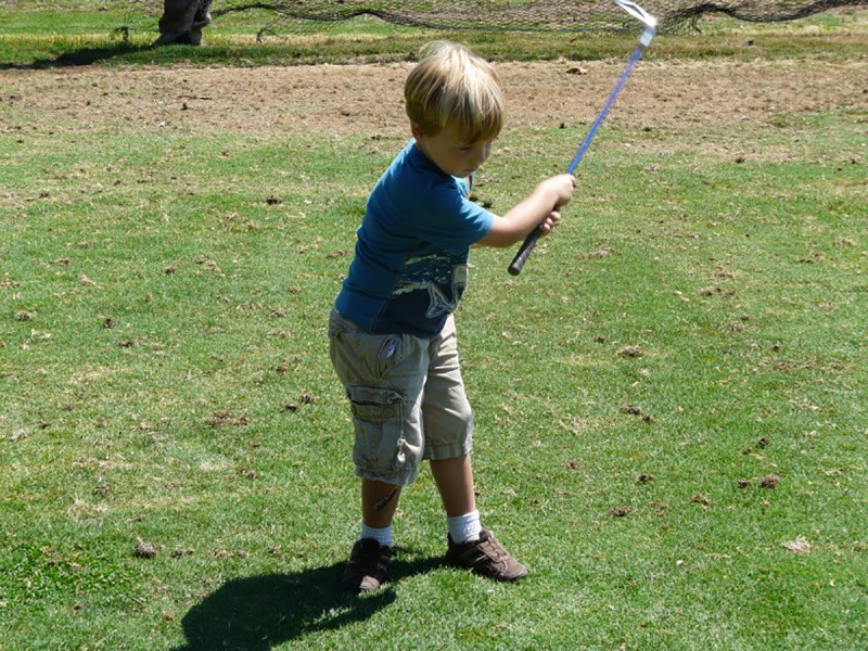 boy playing at Cordova Golf Course