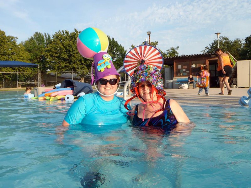 people swimming at Lincoln Village Community Pool